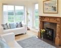 Enjoy a glass of wine at 1 Greyhill Cottages; Wigtownshire