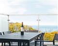 Enjoy a glass of wine at 7 Sandy Lane Penthouse; Cornwall