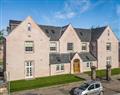 Enjoy a glass of wine at Ardconnel Court Apartments - Apartment 7; Inverness-Shire