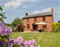 Enjoy a glass of wine at Bare Farm Cottage; Hereford; Herefordshire