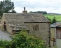 Enjoy a glass of wine at Benchmark Cottage; Keighley; West Yorkshire