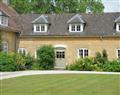 Enjoy a glass of wine at Bruern Holiday Cottages - Wychwood; Gloucestershire