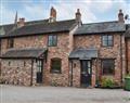 Enjoy a glass of wine at Bumbu Cottage; Herefordshire