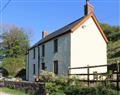 Enjoy a glass of wine at Castle Hill Cottage; Dyfed