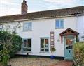 Enjoy a glass of wine at Crossway Cottage; Norfolk