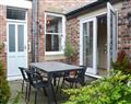 Enjoy a glass of wine at Cuthbert Cottage; Tyne and Wear
