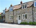 Enjoy a glass of wine at Edgemoor Cottage; North Yorkshire