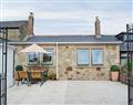 Enjoy a glass of wine at Farne Cottage; Seahouses; Northumberland