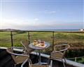 Enjoy a glass of wine at Fistral View at Bredon Court; ; Newquay
