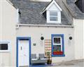 Enjoy a leisurely break at Fountain Cross Cottage; Ross-Shire