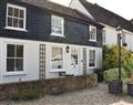 Enjoy a glass of wine at French Horn Cottage; Hertfordshire