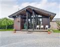 Enjoy a glass of wine at Green View Lodges - Carrock Lodge; Cumbria