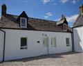 Enjoy a glass of wine at Gruinards Farm Cottage; Ardgay; The Highlands