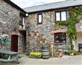 Enjoy a glass of wine at Houndapitt Holiday Cottages - Otters Holt; Cornwall
