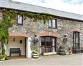 Enjoy a glass of wine at Houndapitt Holiday Cottages - Toad Hall; Cornwall
