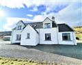 Enjoy a glass of wine at Isle of Skye Holiday Cottages - Heatherbell; Isle Of Skye