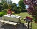 Enjoy a glass of wine at Ivy Cottage; Dumbartonshire