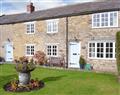 Enjoy a glass of wine at Lilac Cottage; North Yorkshire