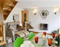 Enjoy a glass of wine at Lily Vale Cottage; West Glamorgan