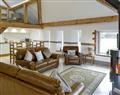 Enjoy a glass of wine at Lower North Radworthy Cottages - Combe View; Devon