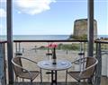 Enjoy a glass of wine at Martello Beach Apartment; East Sussex