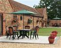 Take things easy at Moor Farm Stable Cottages - Littlewoods Barn; Norfolk