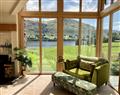 Enjoy a glass of wine at New Lodge; Watermillock; nr Penrith