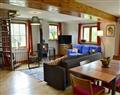Enjoy a glass of wine at North End Farm Cottages - The Old Dairy; England