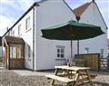 Enjoy a glass of wine at Park Farm Cottage; North Yorkshire