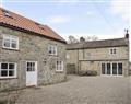 Enjoy a glass of wine at Pear Tree Cottage and The Granary; North Yorkshire