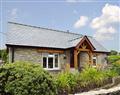Enjoy a glass of wine at Penwern Fach Holiday Cottages - Gwaun Cottage; Dyfed