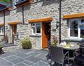 Enjoy a glass of wine at Penwern Fach Holiday Cottages - Teifi; Dyfed