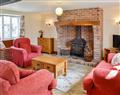 Enjoy a glass of wine at Pilsdon Farm Cottages - Heather Cottage; Dorset