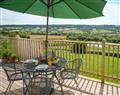 Enjoy a glass of wine at Primrose Farm - Valley View; Devon