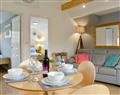Enjoy a glass of wine at Purbeck Apartment; Dorset