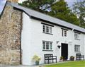 Enjoy a glass of wine at Rivermead Farm Cottages - Farm Cottage; Cornwall