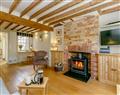 Enjoy a glass of wine at Rose Cottage; West Sussex