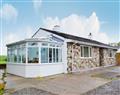 Enjoy a glass of wine at Ruanwell Bungalow; Cornwall
