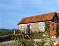 Enjoy a glass of wine at Rudge Farm Cottages - Pigsty Cottage; Dorset