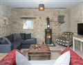 Enjoy a glass of wine at Sands Farm Cottages - The Middle Barn; Wiltshire