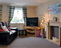 Enjoy a glass of wine at Sea Shell Cottage; Cumbria