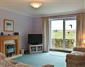 Enjoy a glass of wine at Stable Cottage; Isle Of Arran