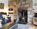 Enjoy a glass of wine at The Bellringers Cottage; Denbighshire