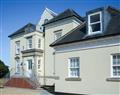 Enjoy a glass of wine at The Highlands - Highlands Apartment 3; Isle of Wight