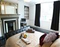 Enjoy a glass of wine at The Marlowe Apartment; Canterbury; Kent