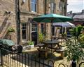 Enjoy a glass of wine at The Old Post Office - Apartment 2; Derbyshire