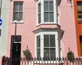Take things easy at The Pink House; ; Tenby