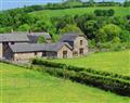 Enjoy a glass of wine at Ty Cerrig Granary; ; Brecon