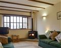 Enjoy a glass of wine at Upper Kington Farm Cottages - The Granary; Hampshire