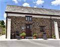 Enjoy a glass of wine at Well Farm Holiday Cottages - Cider Cottage; Cornwall